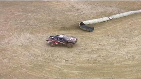 Traxxas Slash 4x4 driving at the Track - box stock (clips)