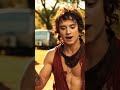 Man in Swimsuit Strikes Epic Poses by the Roadside – Trash Cans Approve!