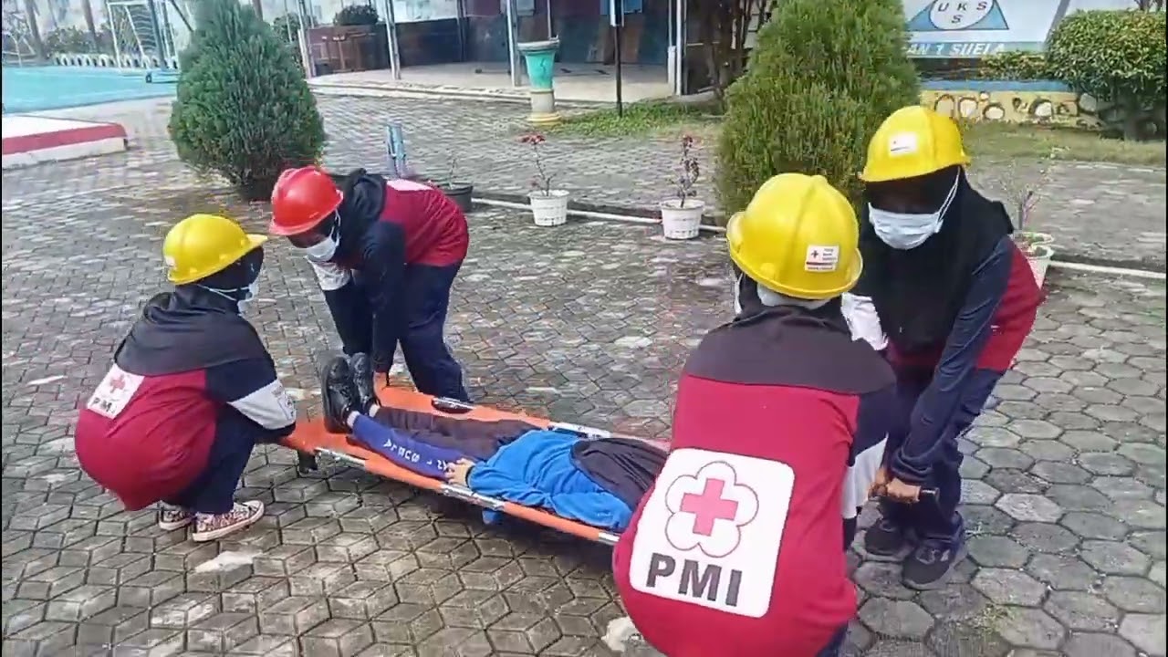 SIMULASI EVAKUASI MANDIRI SMA NEGERI 1 SUELA