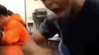 Black man crying with headphones