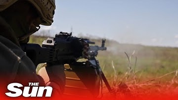 Ukrainian soldiers fire deadly calibre machine guns in training drills