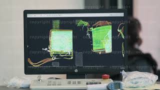Scanned baggage on the x-ray scanner screen in the airport screenshot 5