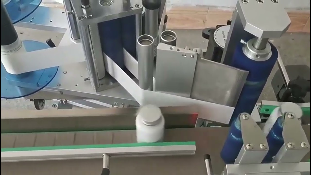 Small round bottle labeling machine, cup cap labeling machine, assembly line labeling machine