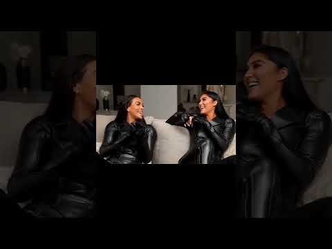 Lesbian In Leather Catsuit Kissing 