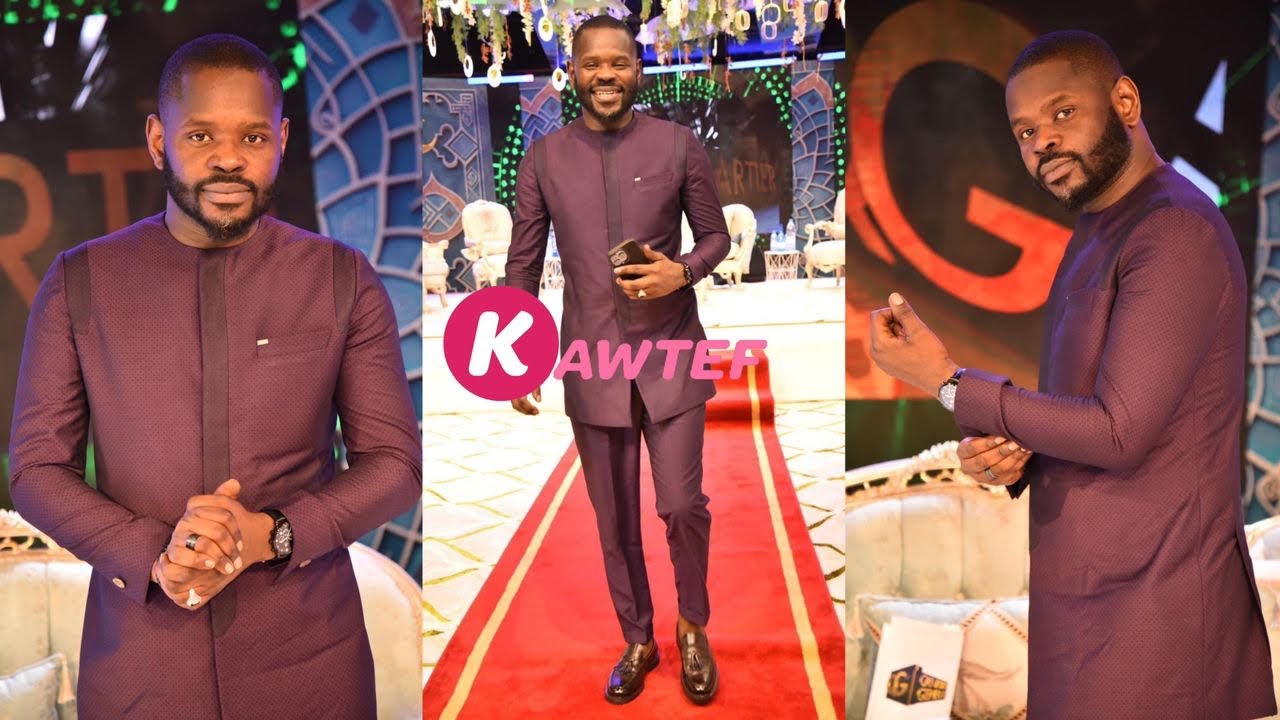 Pape Cheikh Diallo, le boss du Quartier Général très chic dans un costume Africain.