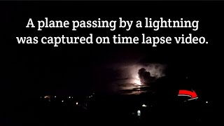 A Plane Passing By A Lightning Was Captured On A Time Lapse Video