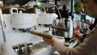 Preparing A Latte At Momo Cafe In Midtown Atlanta