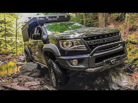 alu-cab-canopy-camper-on-ok4wd-chevrolet-colorado-walk-around-//-overland-expo-east-2019