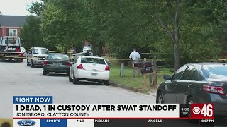 1 dead, 1 in custody after SWAT standoff