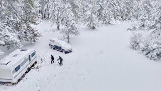 OFFGRID CAMPING WITH STOVE UNDER HEAVY RAIN AND SNOW IN FOREST