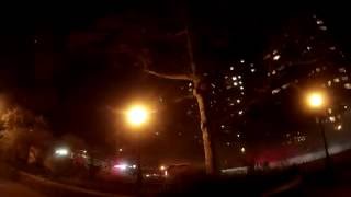 Cycling East River greenway at night and burning car