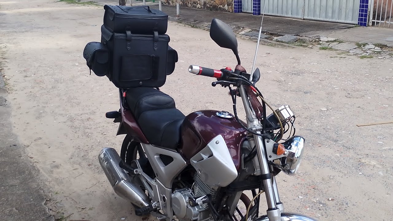 ALFORGE SEGURO: O Método "X" para Fixar no Bagageiro (Passo a Passo + Dica da Cinta de Carga).