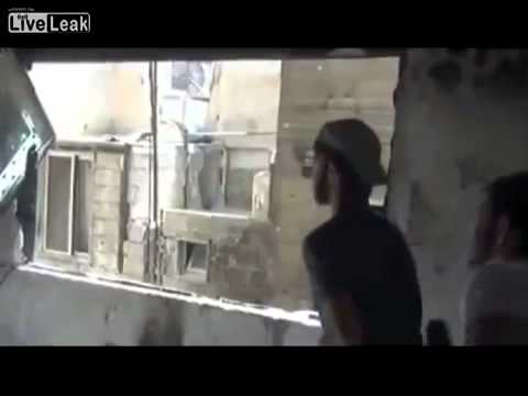 FSA Rebel hit by Syrian Army sniper
