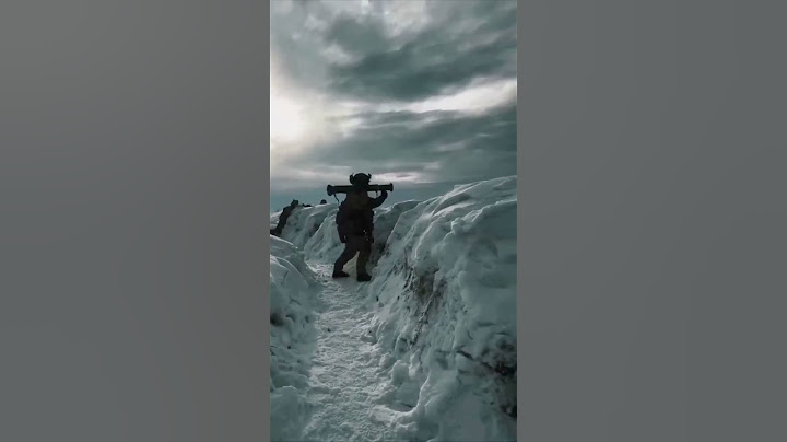 Ukrainian Soldier Fires RPG-7 at Enemy Position