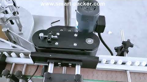 Small round bottle vials horizontal high speed spacing feeding labeling machine labeling video