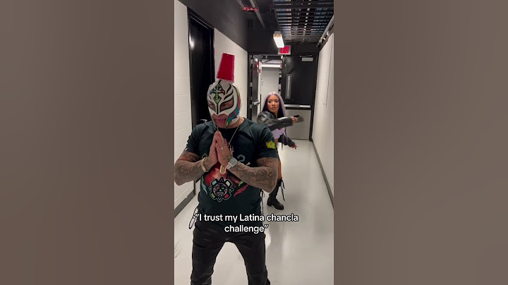 Zelina Vega does the chancla challenge with Rey Mysterio!