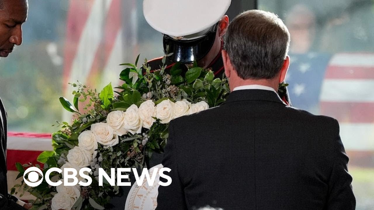 Georgia governor and Carter Center CEO lay wreaths for Jimmy Carter