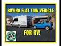 BUYING A FLAT TOW VEHICLE TO PULL BEHIND RV