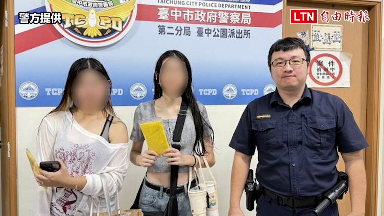 午後暴雨即景!2女高中生全身濕透 暖警遞雨衣叮嚀小心著涼 午後暴雨即景!2女高中生全身濕透 暖警遞雨衣叮嚀小心著涼
