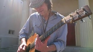 Slide Guitar with a reggae twist...Nelly mixs it up..a la 'Toots and the Maytals'
