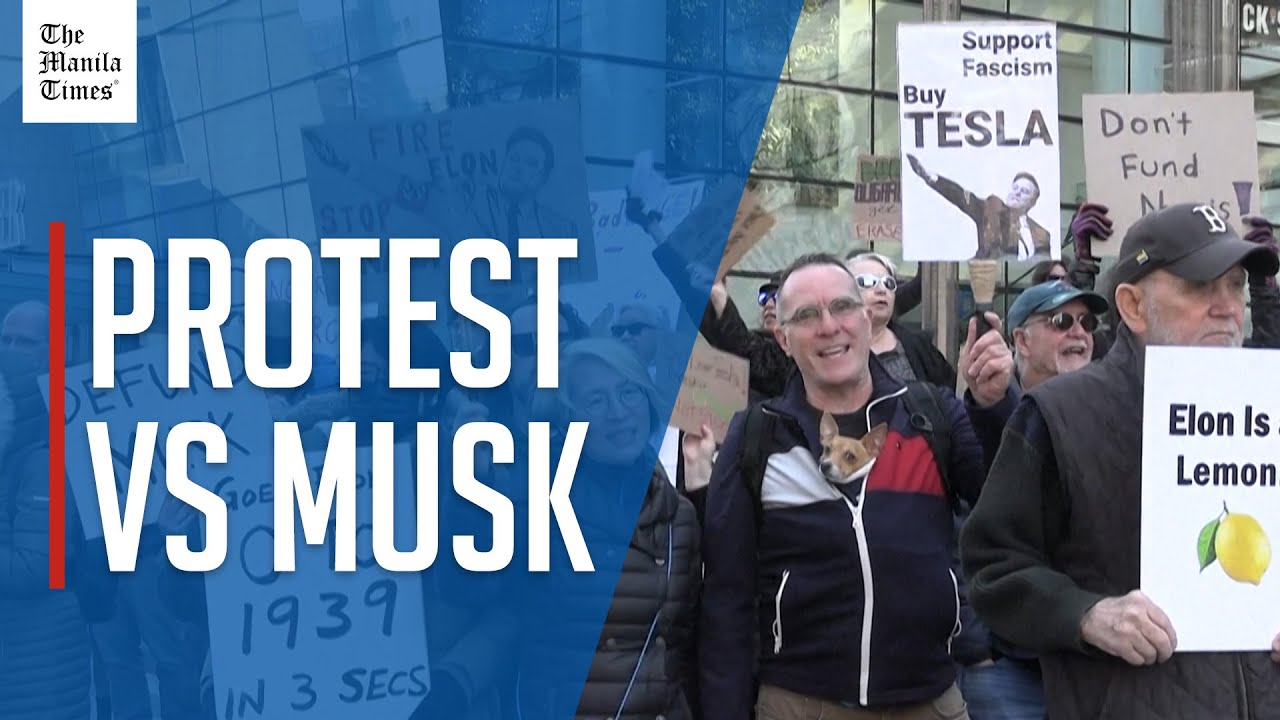 Protesters gather outside Tesla dealership in Boston to oppose Elon ...