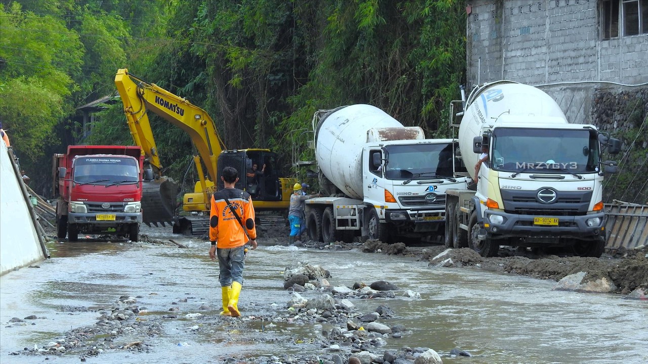 Engineered Strength: Concrete Trucks Convoy Powers Through Massive Bridge Groundsill Repair