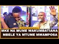 ALIYETOA SHUHUDA NZITO AAMUA KUMKUMBATIA MKEWE MBELE YA MTUME MWAMPOSA MODESTA ATAJWA MAMA AITWA ALIYETOA SHUHUDA NZITO AAMUA KUMKUMBATIA MKEWE MBELE YA MTUME MWAMPOSA MODESTA ATAJWA MAMA AITWA