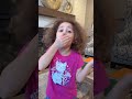 Sierra teaches Rhia healthy habits-eating fruits and veggies makes you strong and healthy