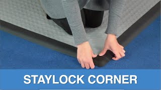 StayLock Tile Corner Reducer - Modular Floor Ramped Edging - Shop StayLock Corners now: https://www.greatmats.com/tile/staylock-corner-black.php or call 877-822-6622
StayLock corners are a two directional ramped edging pieces to be used for transition on on the StayLock line of PVC flooring from Greatmats. These are used in conjunction with StayLock Border Edge strips for any of the StayLock Orange Peel, Bump Top or Perforated Tiles to create a finished edge.
These corners are available in both black and yellow and secure to the border strips using a tab and loop connection system in which the male tabs secure into the female loops.
Yellow corners are designed for high visibility.
The is a great floor corner reducer for home gyms, workshops, decks, patios and pool surrounds.