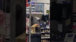 Shocking moment brazen thieves rob Tesco while staff looks on