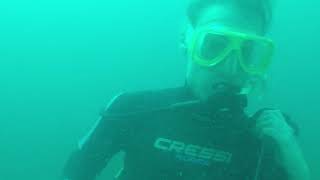Removing BCD during Certification Dive