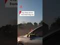 Texas police officer frees driver trapped in burning car on highway