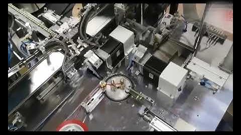 Automatic EE core assembly, taping & testing machine WM-1948CATS. For transformers