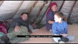 hardship life of reindeer herders in russia. baking bread in tundra