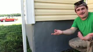 Patch and Paint Exterior Foundation of a House