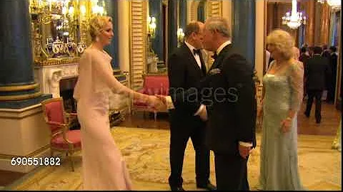 The Prince of Wales and the Duchess of Cornwall gr...