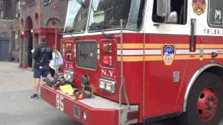 FDNY ENGINE 95 RETURNING TO ITS QUARTERS IN THE INWOOD AREA OF MANHATTAN IN NEW YORK CITY.