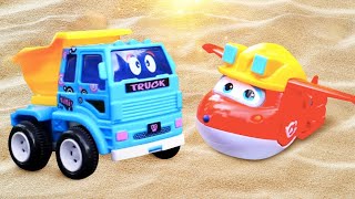 Toy cars for babies in sand. Sand games with baby toys. Sandbox toys &amp; videos for kids.