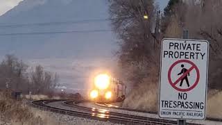 Southbound Frontrunner train passes by speeding up