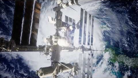 A View of the Earth and a Spaceship. ISS Is Orbiting the Earth | Motion Graphics - Envato elements