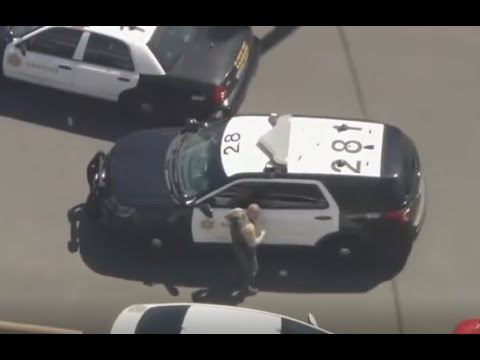Deputy forgets to put his car in park and it rolls away in a pursuit ...