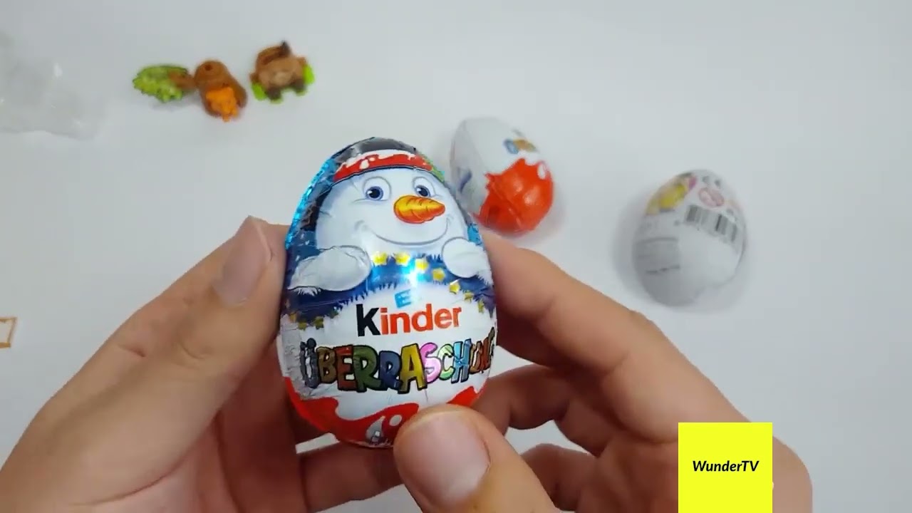 WunderTV - Kinder Egg Toy Play - Let's open these eggs and see what toys are inside.