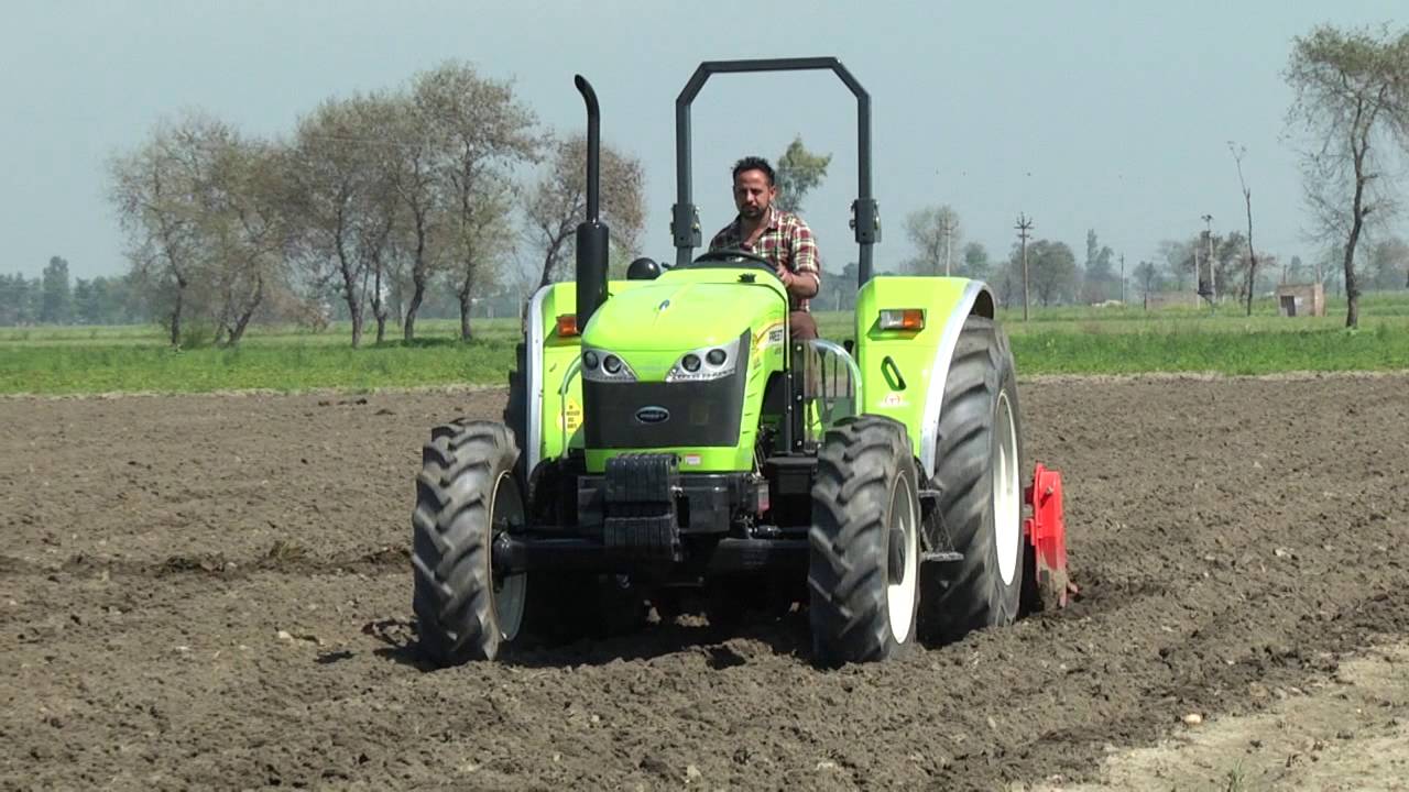 PREET TRACTOR 7549 FOUR WHEEL DRIVE HP WORKING IN FIELD
