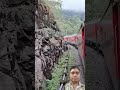 Indian Railways passing through lush green valleys
