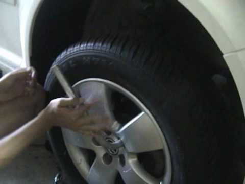 removing-trick-lug-nut-caps-to-change-tires-on-vws