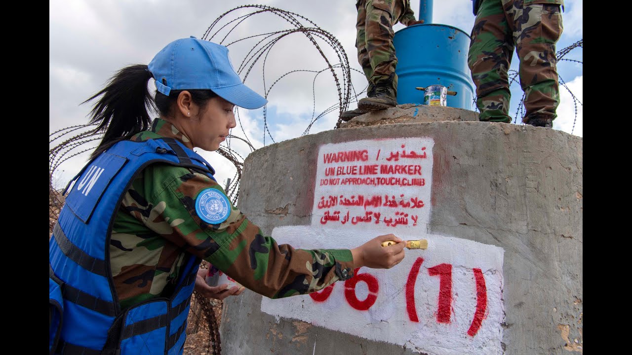 Cambodian And Chinese Peacekeepers Refurbish Blue Barrels, Ensuring Better Security