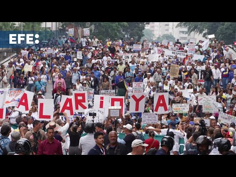 Venezuelan union workers march to demand restoration of labor rights and higher wages
