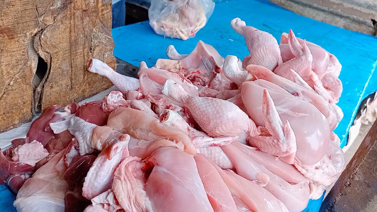 small boy chicken cutting by market || The village show