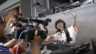 DJ Rinoka bobs to the beat as a child prodigy techno artist