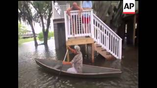 Bands of heavy rain and strong wind gusts from Tropical Storm Lee knocked out power to thousands in